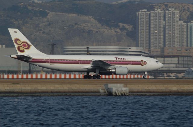 Airbus A300F4-600 (HS-TAD) - Departure at Kai-Tak Intl Airport Rwy31 on 1991/12/15