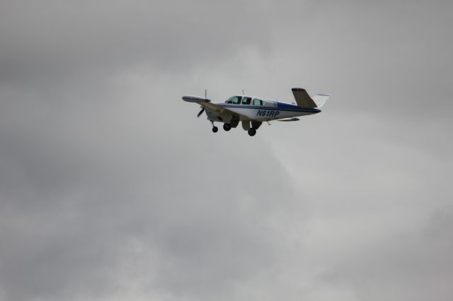 Beechcraft 35 Bonanza (N61RP) - n61rp taking off from KRFD, en route to Oshkosh 2013