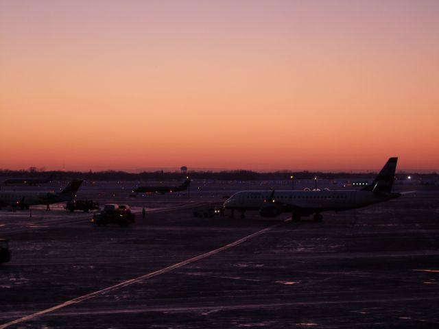 — — - Sunset at ORD after the Blizzard of December 2009