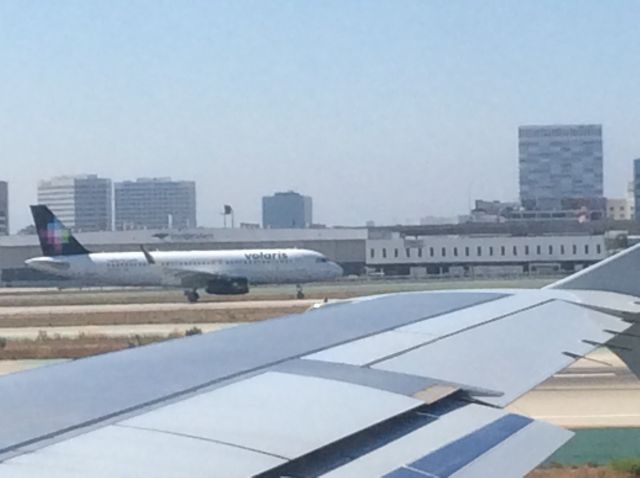 Airbus A320 — - Taken on board an American a319. 