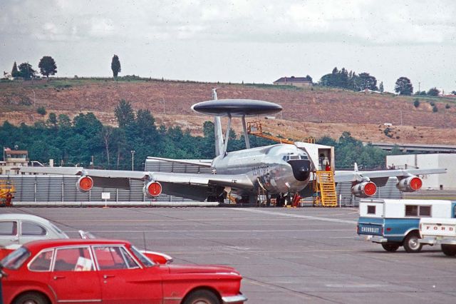 Boeing 707-300 (71-1408) - The second Boeing EC-137D 71-1408 at Boeing Field in Seattle on June 18, 1973. Its construction number is 20519. It differed from the production E-3 Sentry in having the full complement of passenger windows and bare metal fuselage. It was held by Boeing for tests before it was converted to E-3A standard. It was delivered to the Air Force as an E-3A on December 15, 1978. It was later converted to E-3B standard.