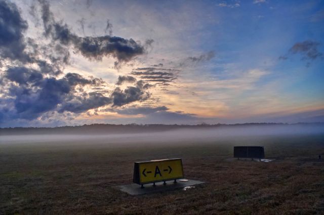 — — - The fog rolls in at LaGrange Callaway Airport.