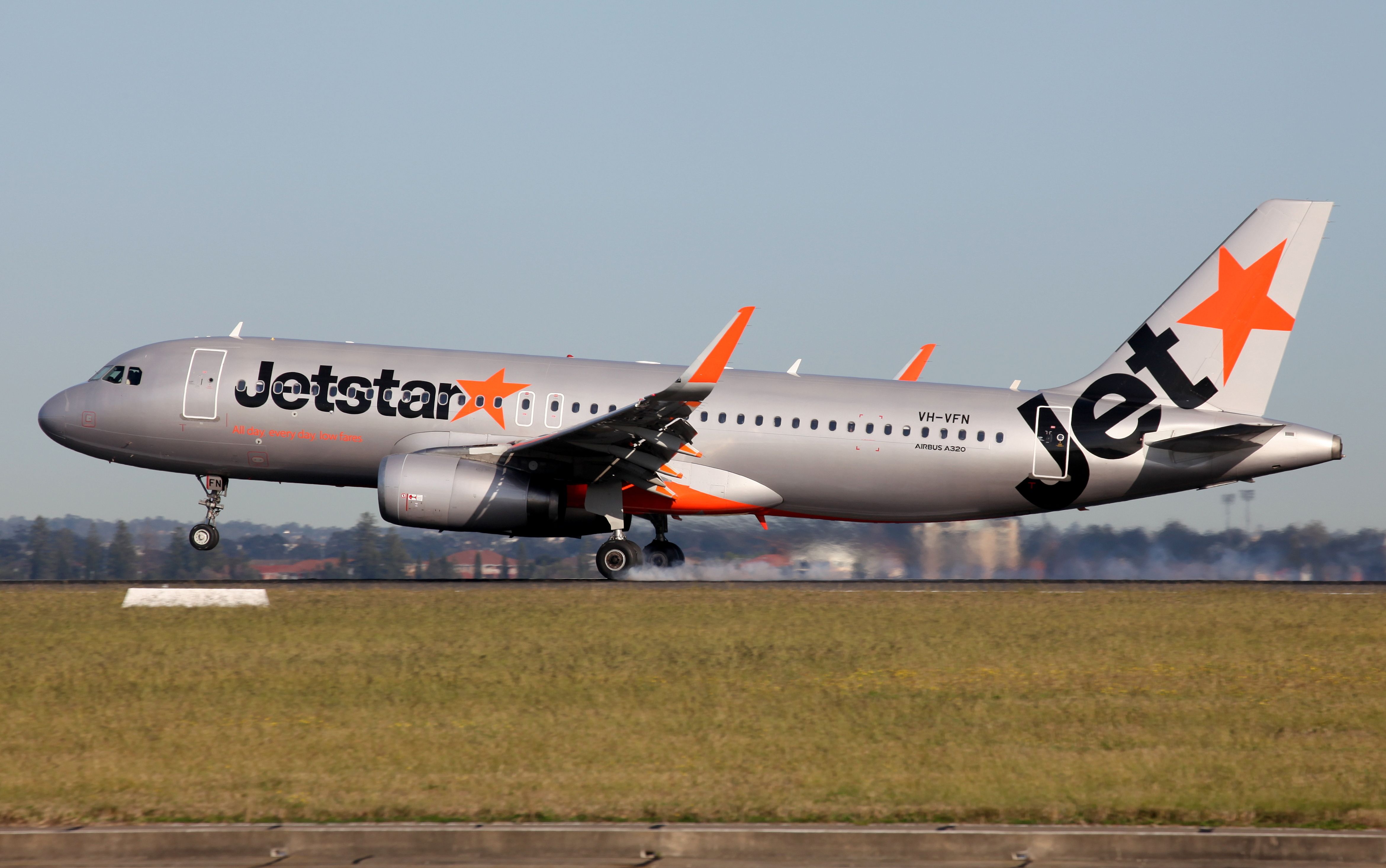 Airbus A320 (VH-VFN) - Touching Down Rwy 16L