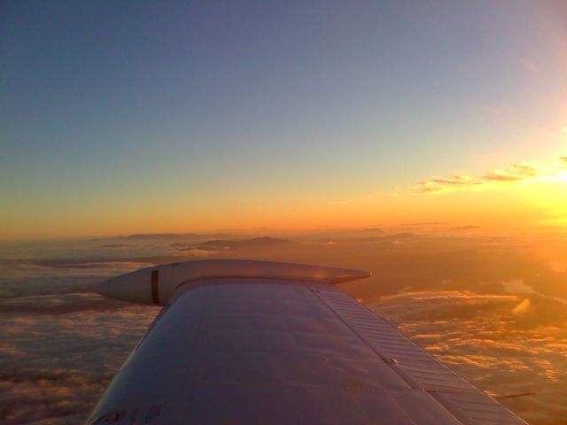 Beechcraft 35 Bonanza (N7835V) - Oct 2012 NC Mountains rising above low overcast at sunset