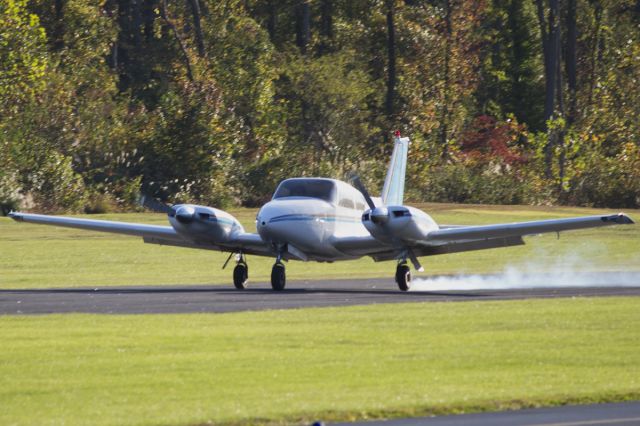 Piper PA-30 Twin Comanche (N7690Y) - Touching down on runway 6 for the first time at its new home.