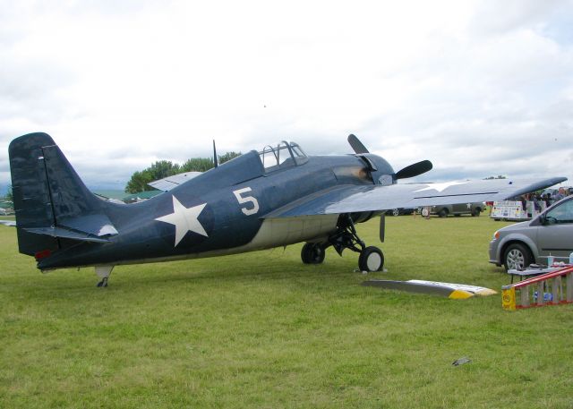 Cessna Skylane (N5HP) - AirVenture 2016.  1945 Grumman FM-2 
