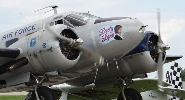 Beechcraft 18 (N480P) - A Beech 18 with "Lady Lynn" on the nose taxing out for departure at Oshkosh AirVenture 2015!