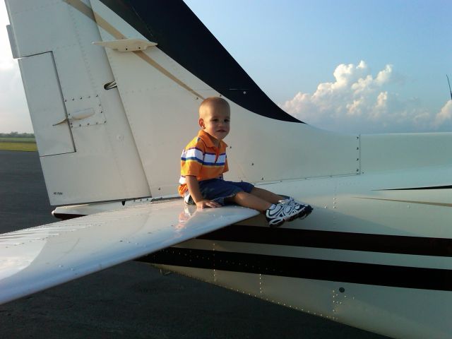 Beechcraft 55 Baron (N1832W) - Cason Allen Plaugher, grandson of David Moore and son of Jenny and Chad Plaugher. He wonders if I can really stay on this tail during takeoff?