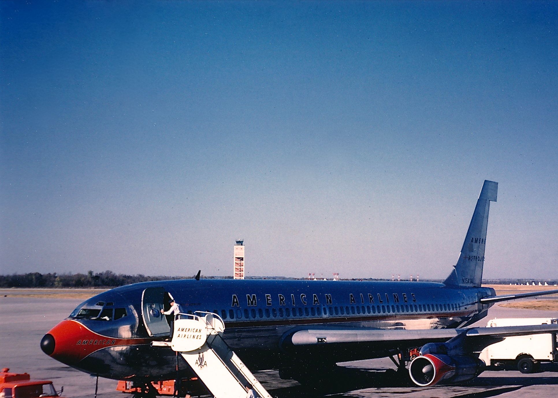 Boeing 707-100 (N7543A) - American Airlines B720 ready for boarding at KTUL in the mid 1969's