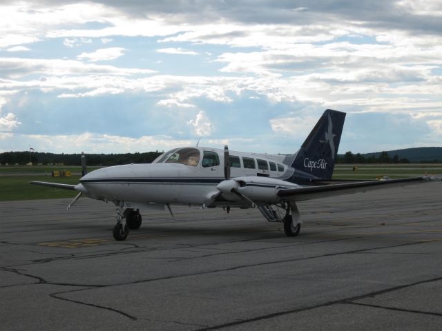 Cessna 402 (KAP149) - Parked on the Cape Air ramp.