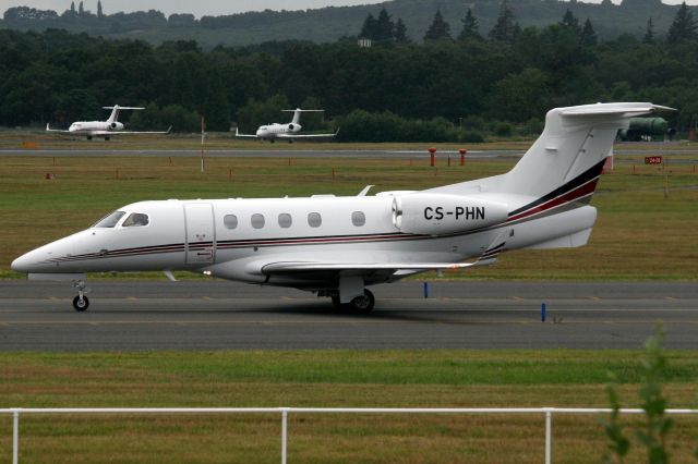 Embraer Phenom 300 (CS-PHN) - NetJets Europe Phenom 300 on 26-Jul-19 taxiing to depart rwy 24 heading for LFMN as NJE154B.