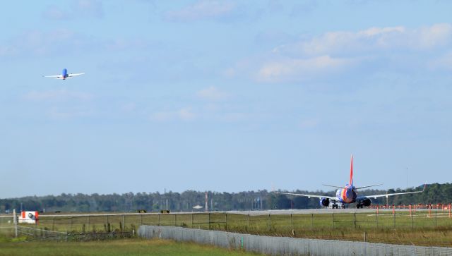 Boeing 737-700 (N242WN) - 10/08/22 N242WN moves in to position on Rwy 35L as N260WN departs on same.