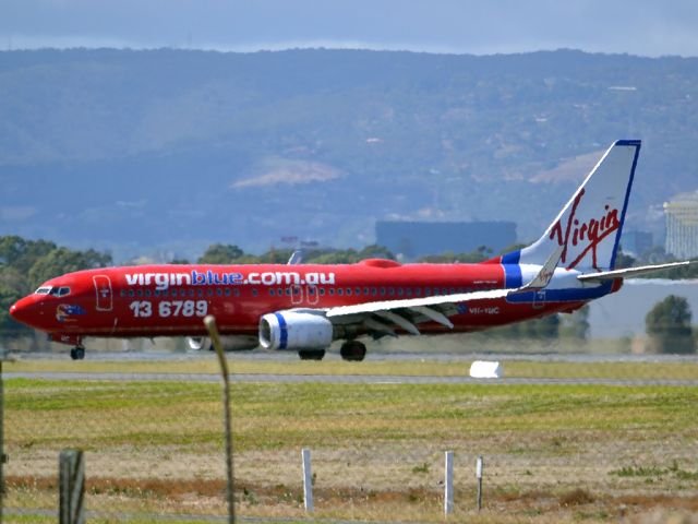 Boeing 737-800 (VH-VUC) - On taxi-way heading for Terminal 1, after arrival on runway 23.