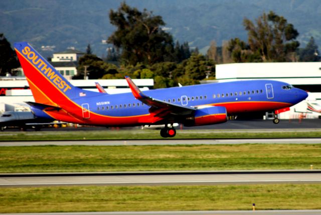 Boeing 737-700 (N551WN) - Departure 30R, March 20, 2010, Shot from inside Terminal A
