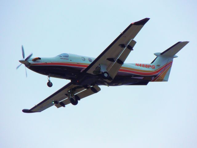 Pilatus PC-12 (N488PG) - On final to Iron River, Michigan