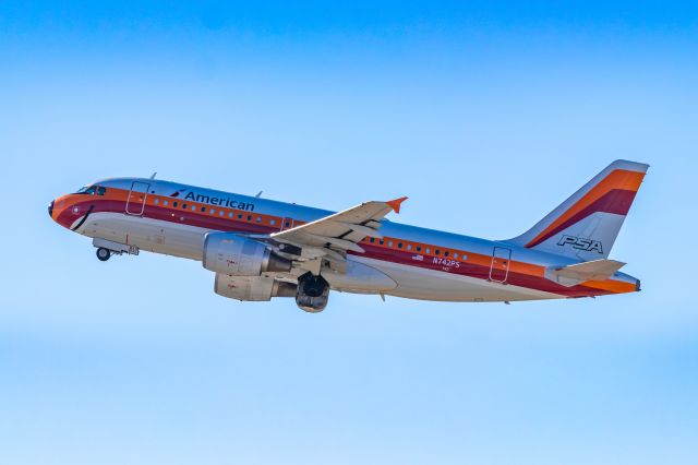 Airbus A319 (N742PS) - American Airlines A319 in PSA retro livery taking off from PHX on 10/29/22. Taken with a Canon 850D and Tamron 70-200 G2 lens.