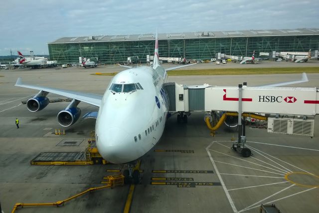 Boeing 747-400 (G-CIVM) - 16-8-2014. British Airways Boeing 747-400 G-CIVM on stand at London Heathrow Terminal 5 after returning from San Francisco. This aircraft (msn: 28700) had its first flight on 27-5-1997 and she is equiped with 4 x Rolls Royce RB-211 engines and has a 4 class seating configuration including 14 in BA First Class.br /br /The staggering size of the iconic B747 in its -400 variant is most impressive when you can get up close.