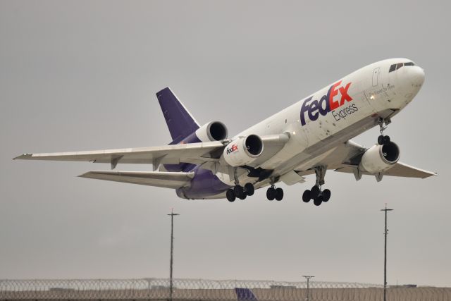 McDonnell Douglas DC-10 (N319FE) - Departing 23-L at IND on it's final flight to VCV.