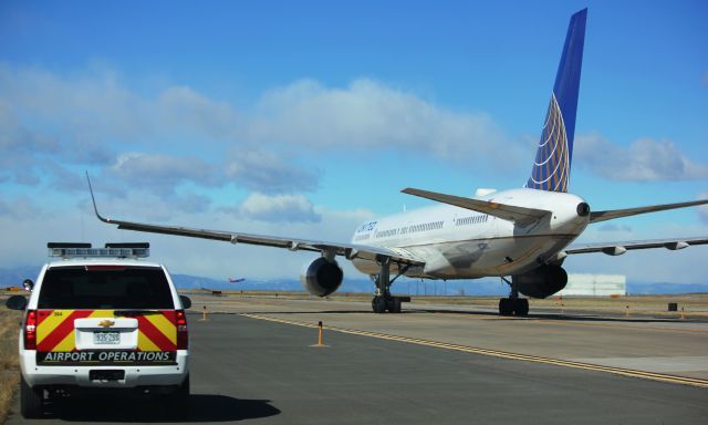 BOEING 757-300 (N57870) - Following a pretty girl down taxiway delta.