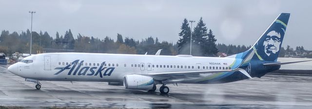 Boeing 737-900 (N224AK) - From another aircraft on SeaTac taxiway