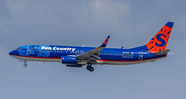 Boeing 737-800 (N814SY) - SCX423 arrives from Minneapolis/St.Paul, here on short finals for runway 24R at LAX