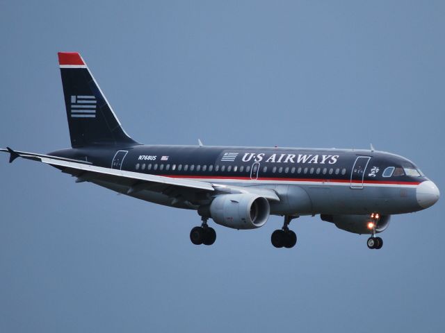 Airbus A319 (N768US) - Final for 23 just after a heavy rain/wind storm - 4/8/10