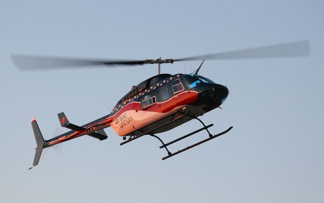 N74AE — - An Air Evac Lifeteam helicopter approaches Sparks Regional Medical Center in the early evening,.