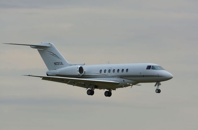 Hawker Beechcraft 4000 (N237JL) - On final to 24R in CYHU. 05-10-2020