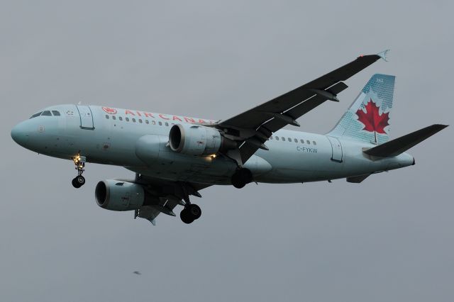 Airbus A319 (C-FYKW) - Arriving from Denver, CO.