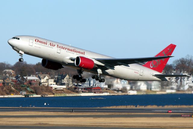 Boeing 777-200 (N828AX) - Omni 357 departing on 33L for Hickham Field in Honolulu, HI br /after arriving from Minneapolis as a Superbowl charter.