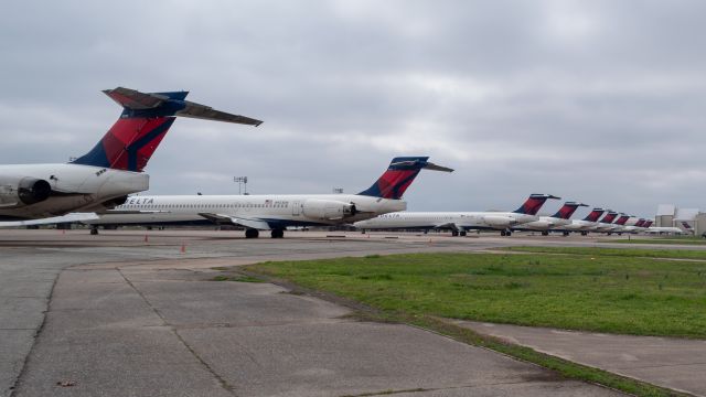 McDonnell Douglas MD-80 — - The views are pretty depressing at byh right now. At least 5 rows of delta md80s sitting on the ramp and another two rows down at the old ready pad at byh. Rip to these md80s/90s