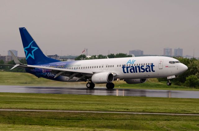 Boeing 737-800 (C-GTQB) - 1st Air Transat B738 w-Split Scimitar Winglets C-GTQB logo