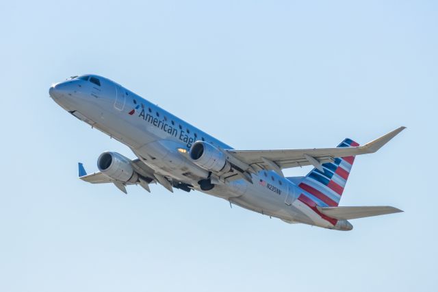 Embraer 175 (N235NN) - An American Eagle ERJ175 taking off from PHX on 2/11/23 during the Super Bowl rush. Taken with a Canon R7 and Canon EF 100-400 II L lens.