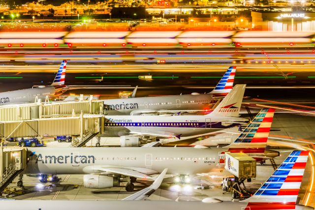 Airbus A319 (N745VJ) - An American Airlines A319 in Allegheny retro livery parked at PHX on 2/11/23 during the Super Bowl rush. Taken with a Canon R7 and Canon EF 100-400 II L lens.