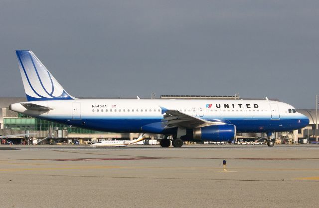 Airbus A320 (N445UA) - This is another photo taken off of my old computer. It was taken 5/22/2011. This is my first and probably only uploaded photo in these United colors (Im still looking through the pictures but I dont think I have another). I must admit I didnt like this livery much when it was used across the fleet but now that it is gone I kind of miss it.