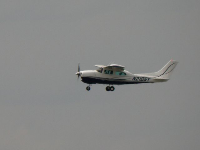 Cessna Centurion (N210SY) - N210SY, a Cessna 210, just off the active, departing Blue Grass Airport (KLEX)...