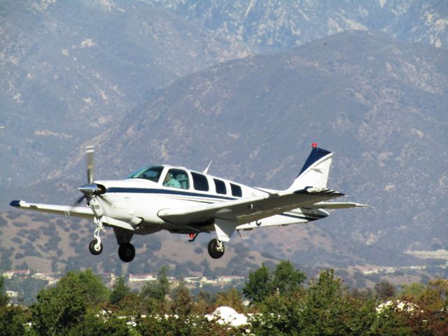 Beechcraft Bonanza (36) (N588PC) - Taking off RWY 26L