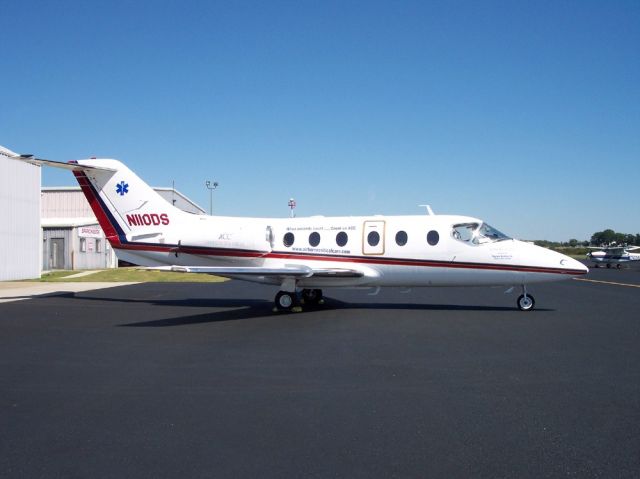 Mitsubishi MU-300 Diamond (N110DS) - ACC - Airborne Critical Care, LLCs air ambulance Critical Care One on the ramp infront of its corporate hanger in NC.