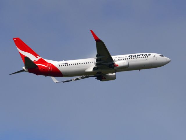 Boeing 737-800 (VH-VXD) - Getting airborne off runway 23 on a gloomy, cold winters day. Wednesday 4th July 2012.