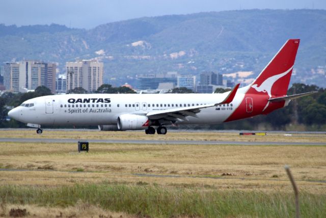 Boeing 737-800 (VH-VBY) - On taxi-way heading for Terminal 1 after landing on runway 23. Friday 1st February 2013.