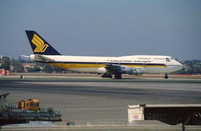 BOEING 747-300 (N123KJ) - Taxing at KLAX Intl Airport on 1989/09/01