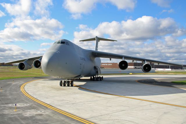 Lockheed C-5 Galaxy (87-0042) - A sunny Sunday autumn morning made for colorful shots of the gigantic Lockheed C-5B Galaxy, 87-0042 (c/n 500-0128) parked on south end of newly completed TWY Quebec on 31 Oct 2010.