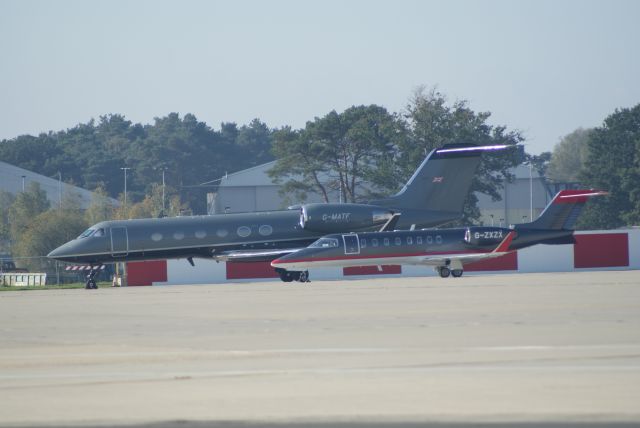 G-MATF — - GAMA AVIATION GULFSTREAM 4 & LEARJET 45 PARKED OUTSIDE HANDER #1 @ FARNBOROUGH AIRPORT