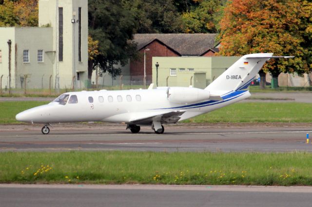 Cessna Citation CJ2+ (D-IBEA) - Taxiing off rwy 21 on 20-Sep-22 arriving from EDDK.