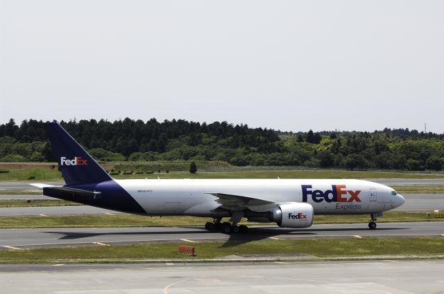 Boeing 777-200 (N854FD) - Taxing at Narita Intl Airport on 2016/05/22