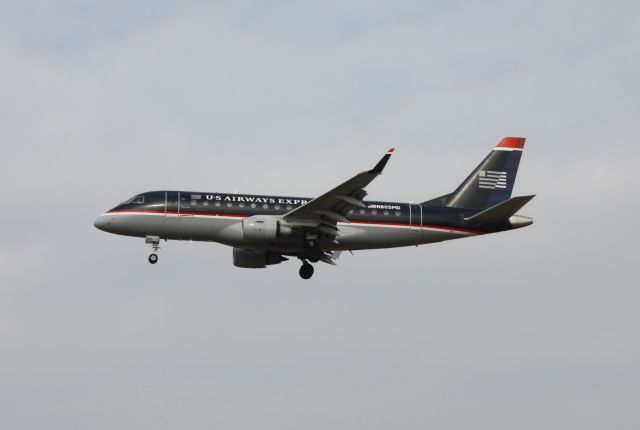 Embraer 170/175 (N805MD) - On final for runway 27R at Philadelphia International Airport. Note the replaced rudder