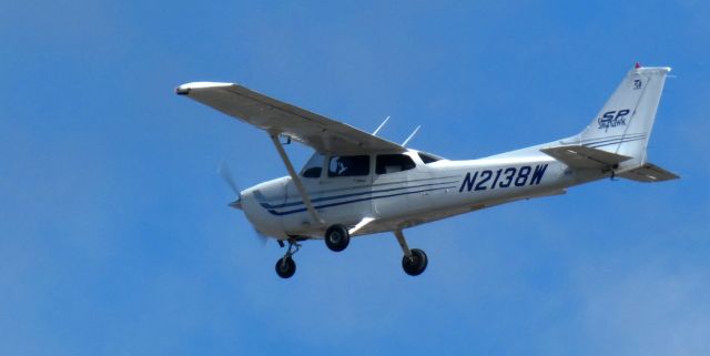 Cessna Skyhawk (N2138W) - About to touch down is this 2003 Cessna 172S Skyhawk SP from the Winter of 2024.