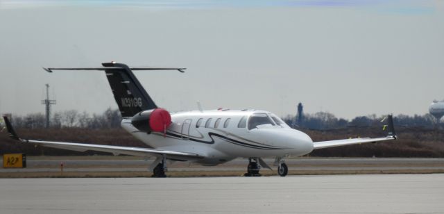 Cessna Citation CJ1 (N331GG) - Catching some tarmac time is this 1999 Cessna 525 Citation 1 in the Winter of 2023.