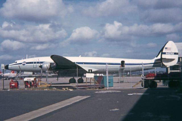 Lockheed EC-121 Constellation (N421NA) - Back in the day I didn’t keep records but I visited Sydney in late 1972 with a Kodak Instamatic - didn’t know what an SLR was back then. I walked a lot around parts of Sydney’s Kingsford Smith Airport and this NASA Connie was one of the aircraft I found - this pic is cropped from a slide.br /br /According to a NASA log it departed Sydney December 1 and had been there from November 25.br /br /NASA had two C121G Connies, NASA 420 and NASA 421, and on June 25, 1969 both received civil registrations, N420NA and N421NA respectively. They were used in support of NASA Apollo space missions and often visited Australia because of Australia’s involvement in the program.