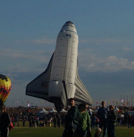 — — - Inflation of Space Shuttle